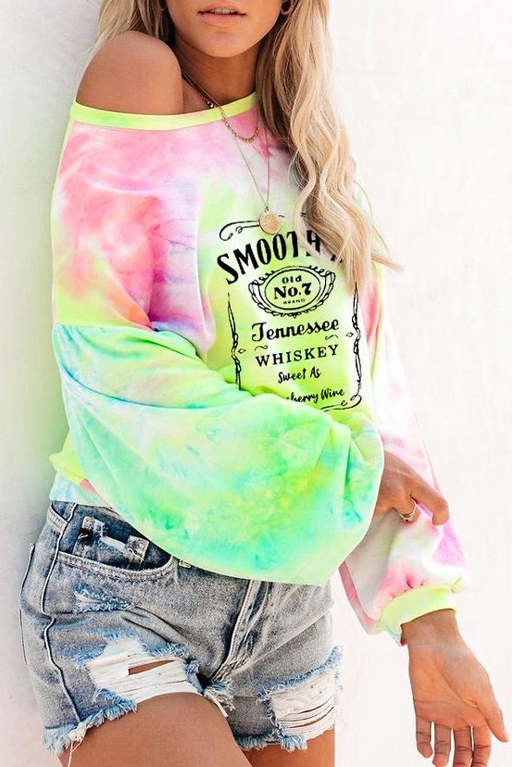 A vibrant multicolor tie-dye sweatshirt featuring a trendy letters graphic print on the front, showcasing a relaxed fit and drop sleeves design.