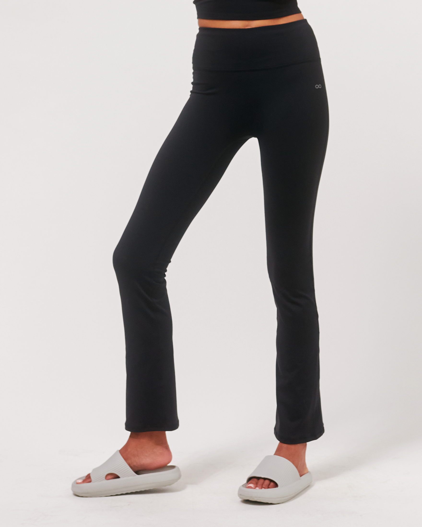 Lexi Bootcut Cloudlux Legging in black, featuring a flared opening and high-waisted design, made from breathable fabric.