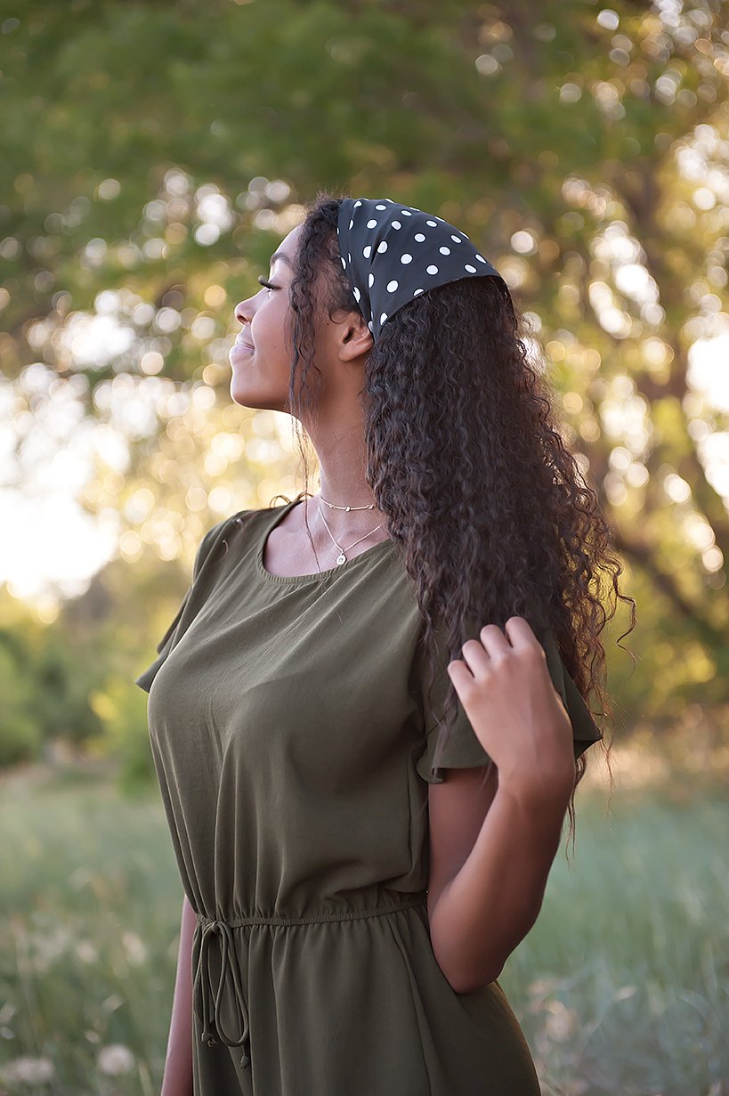 Lexie Ruffle Hem Romper in Olive featuring ruffle sleeves and adjustable waistband, perfect for summer wear.