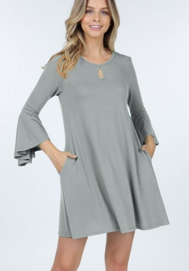 Light gray dress featuring ruffle sleeves, keyhole detail, and side pockets, perfect for casual or formal wear.