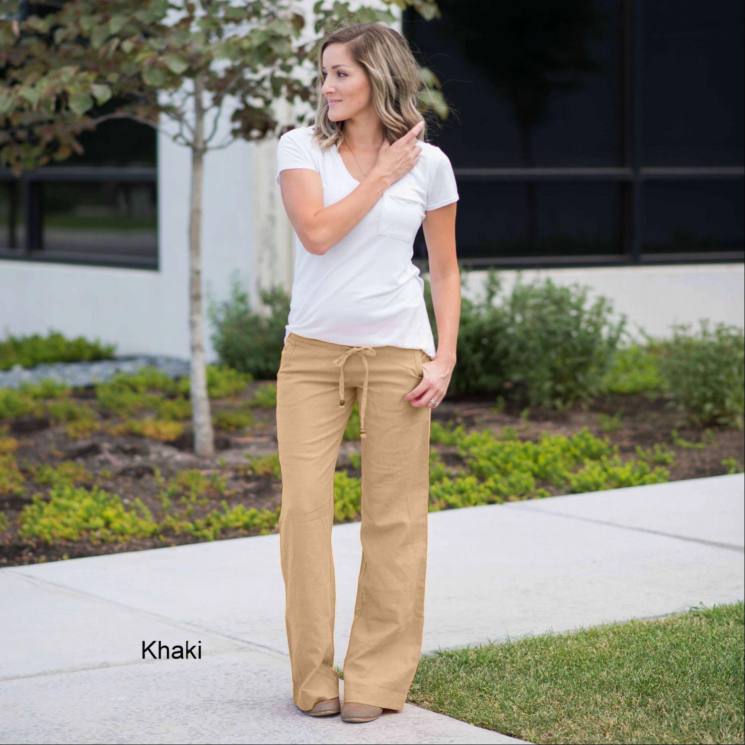 A pair of stylish linen work pants featuring a drawstring waist, perfect for both casual and professional settings.