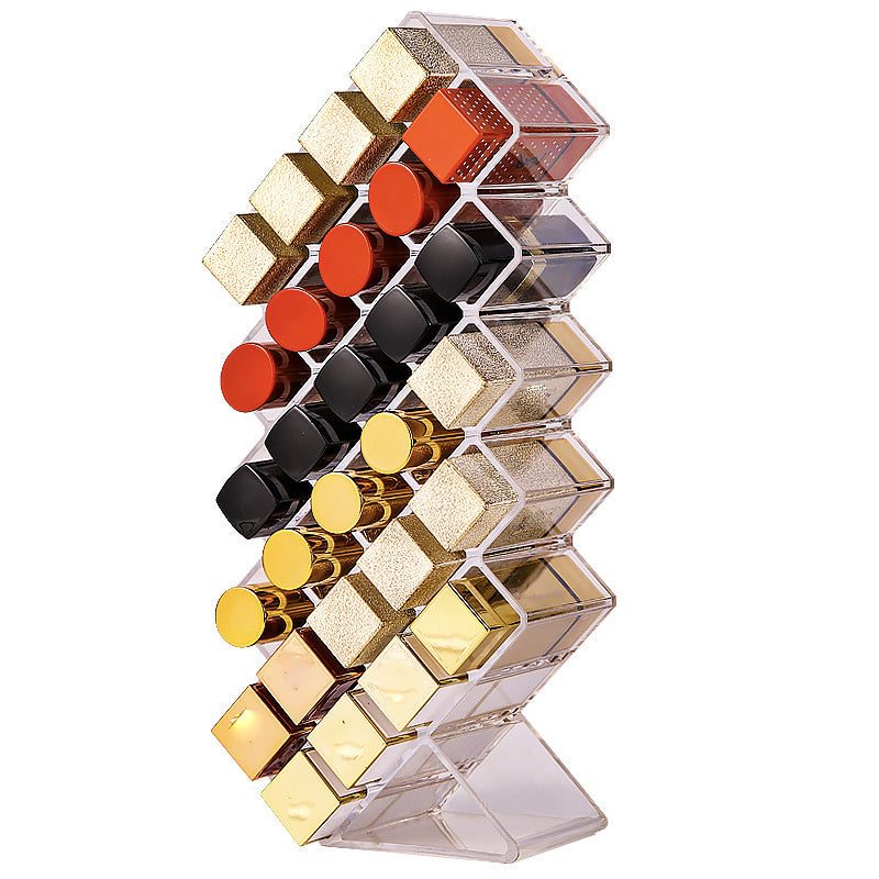 A clear acrylic lipstick holder organizer displaying multiple lipsticks in an elegant arrangement.