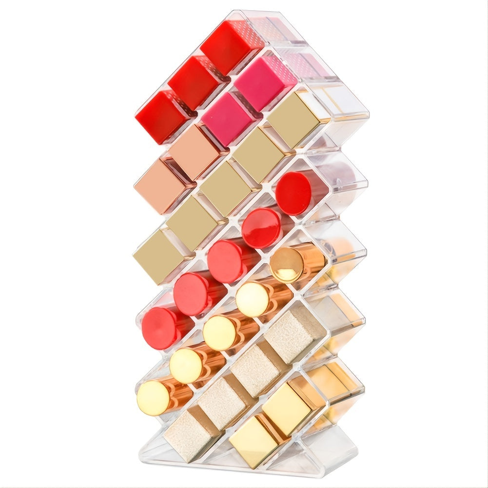 A clear acrylic lipstick holder organizer displaying multiple lipsticks in an elegant arrangement.