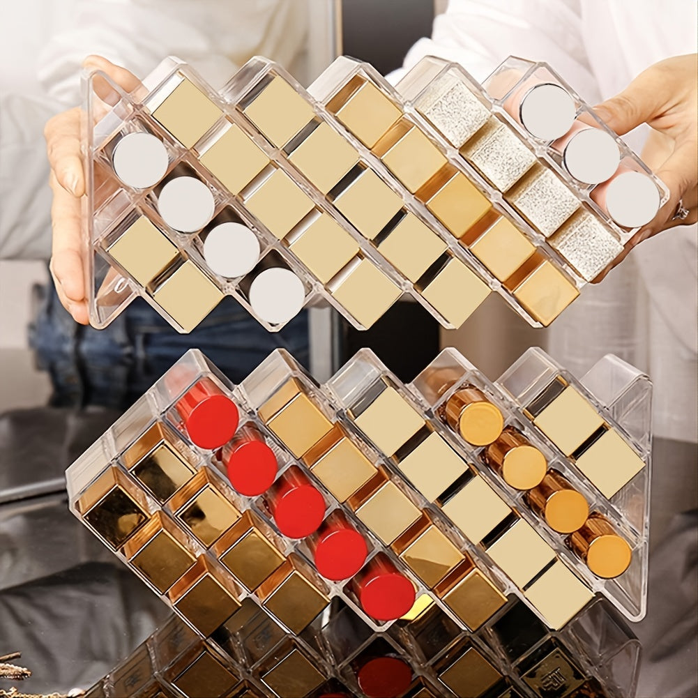 A clear acrylic lipstick holder organizer displaying multiple lipsticks in an elegant arrangement.