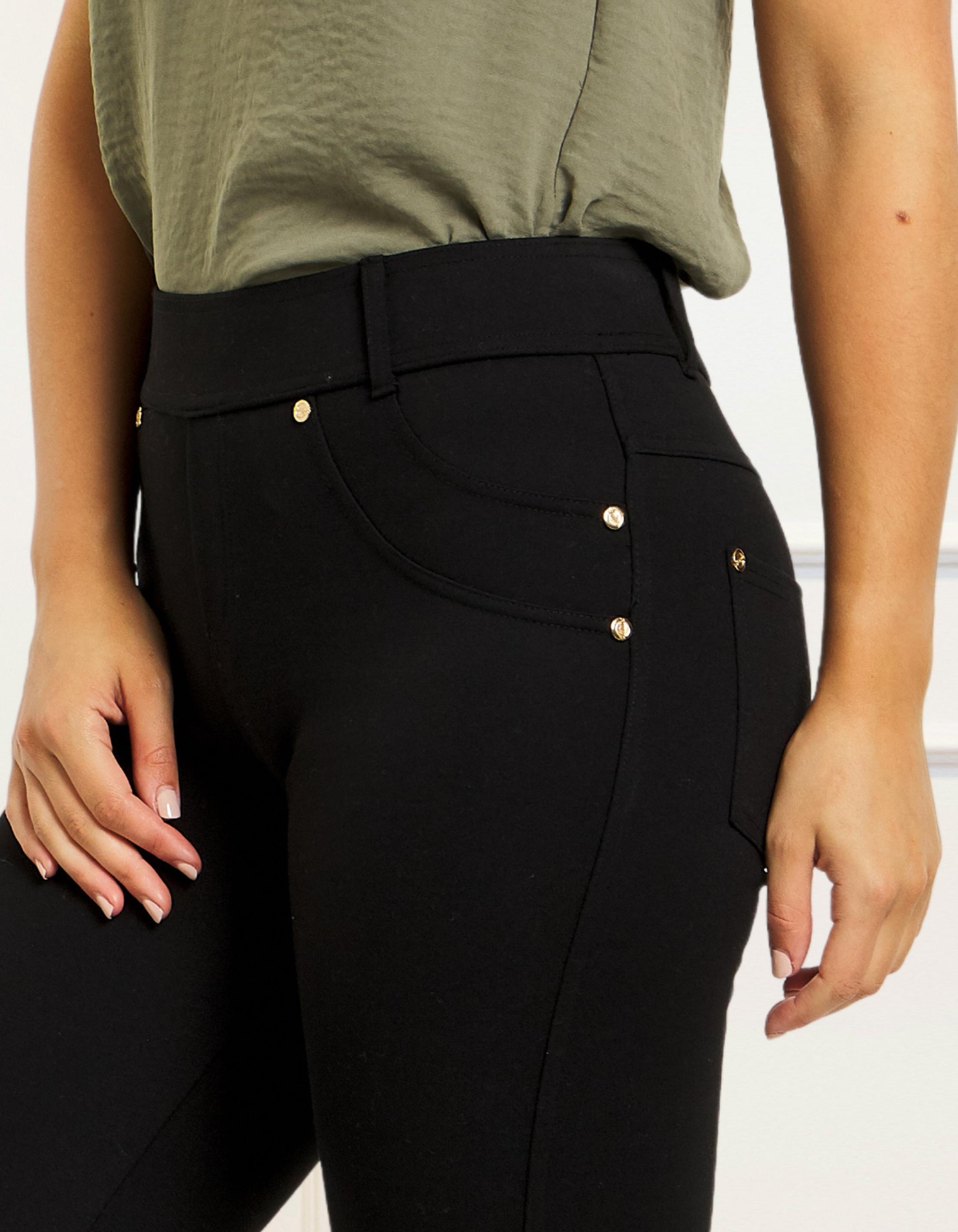 Lisa Stretch Pants in solid black, showcasing a slim fit design with faux front pocket and functional back pockets.