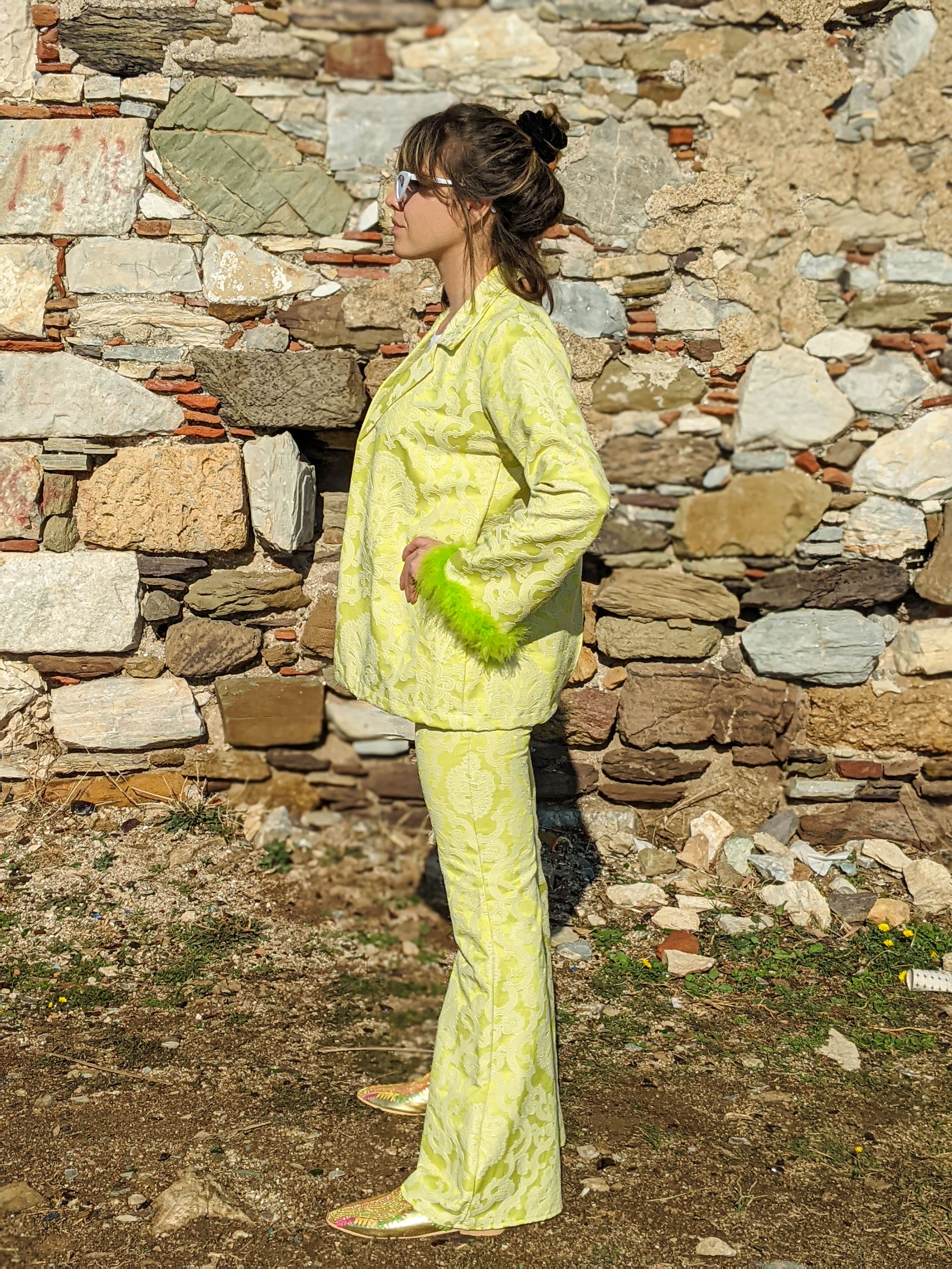 LISSA self-embossed brocade jacket and pants suit with neon green feather details, showcasing a stylish and modern design.