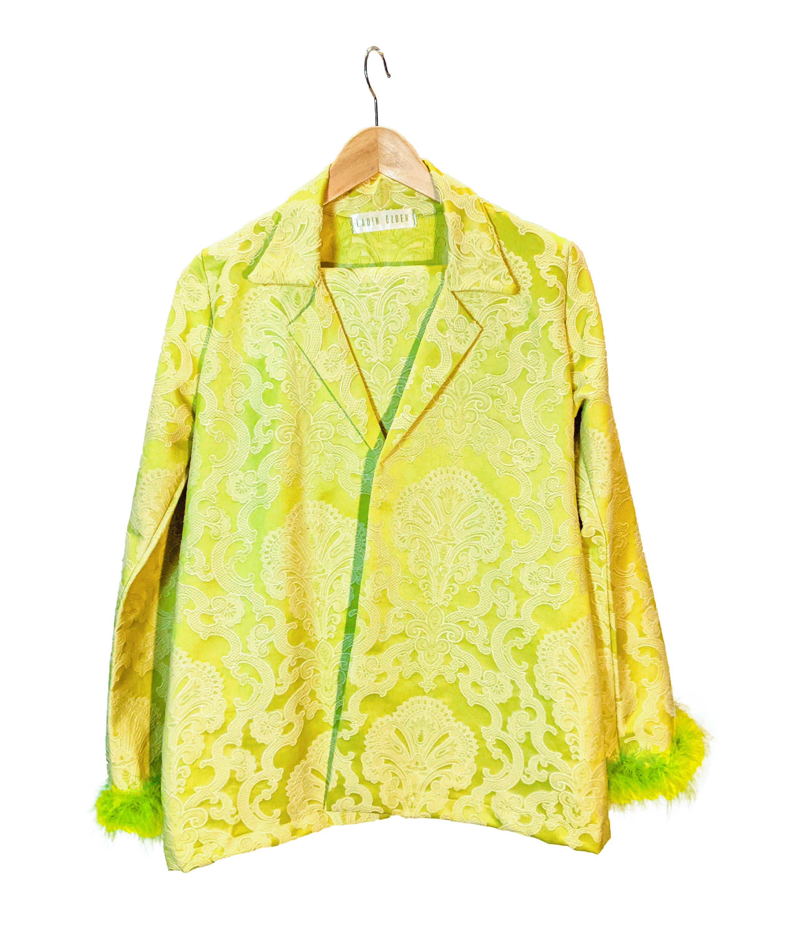 LISSA self-embossed brocade jacket and pants suit with neon green feather details, showcasing a stylish and modern design.