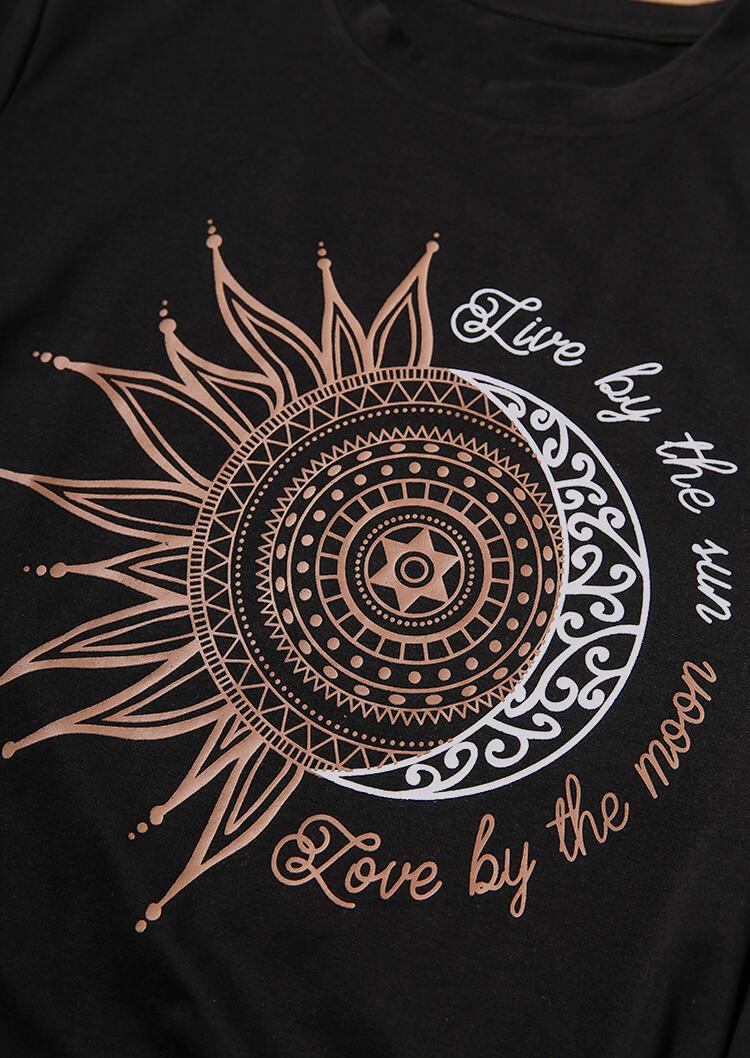 Black graphic tee featuring 'Live By The Sun Love By The Moon' design, showcasing a Bohemian style.