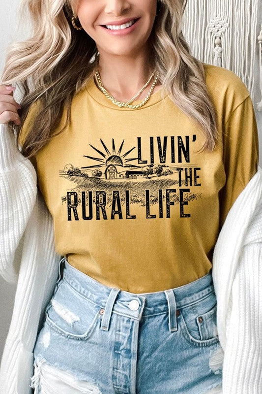 LIVIN THE RURAL LIFE TEE featuring a stylish graphic design, made from 100% cotton, available in various colors.