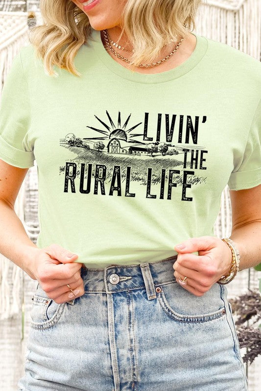 LIVIN THE RURAL LIFE TEE featuring a stylish graphic design, made from 100% cotton, available in various colors.