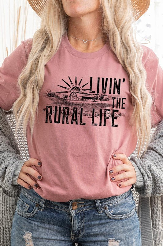 LIVIN THE RURAL LIFE TEE featuring a stylish graphic design, made from 100% cotton, available in various colors.