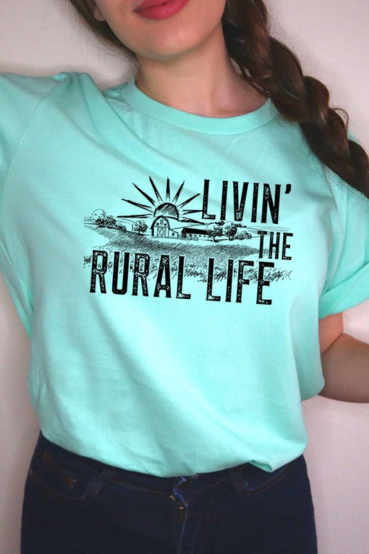 LIVIN THE RURAL LIFE TEE featuring a stylish graphic design, made from 100% cotton, available in various colors.