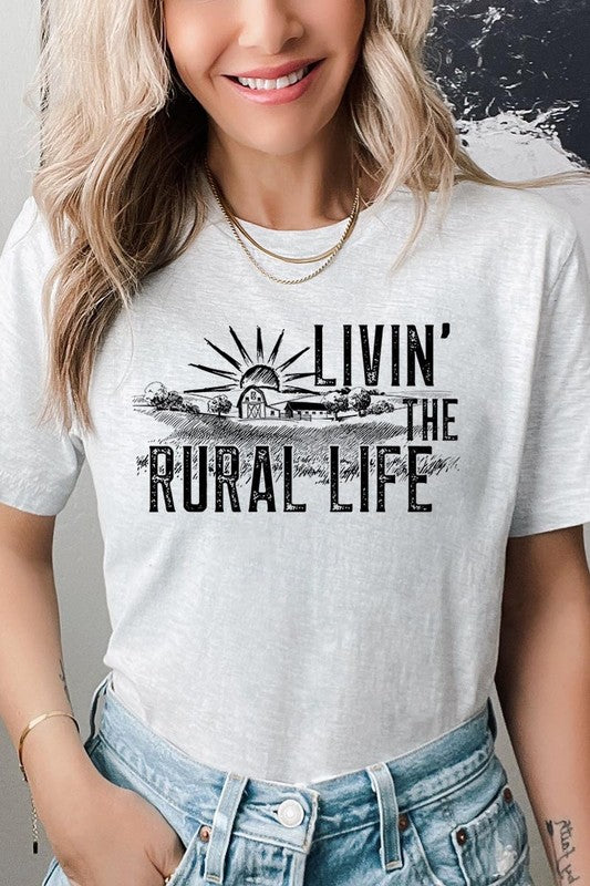 LIVIN THE RURAL LIFE TEE featuring a stylish graphic design, made from 100% cotton, available in various colors.