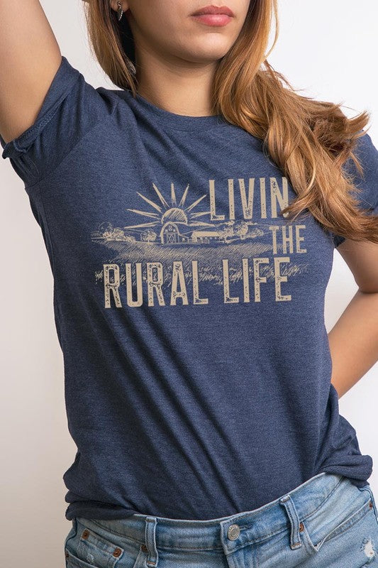 LIVIN THE RURAL LIFE TEE featuring a stylish graphic design, made from 100% cotton, available in various colors.