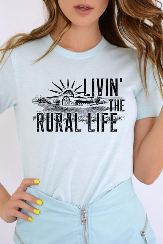 LIVIN THE RURAL LIFE TEE featuring a stylish graphic design, made from 100% cotton, available in various colors.