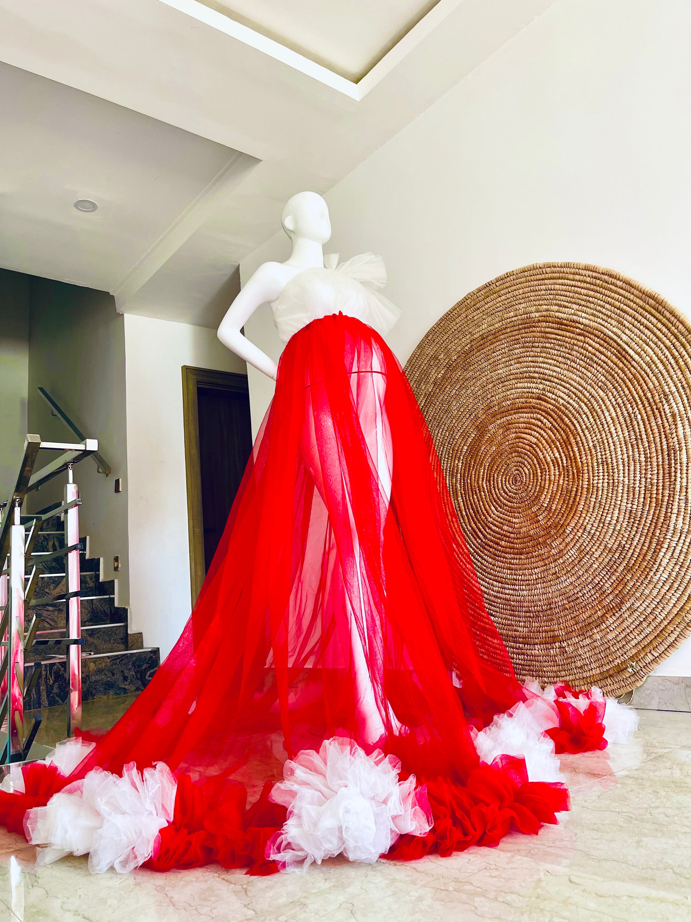 A stylish Liza-Red and White dress featuring a one-shoulder design and flowy tulle fabric, perfect for summer outings.