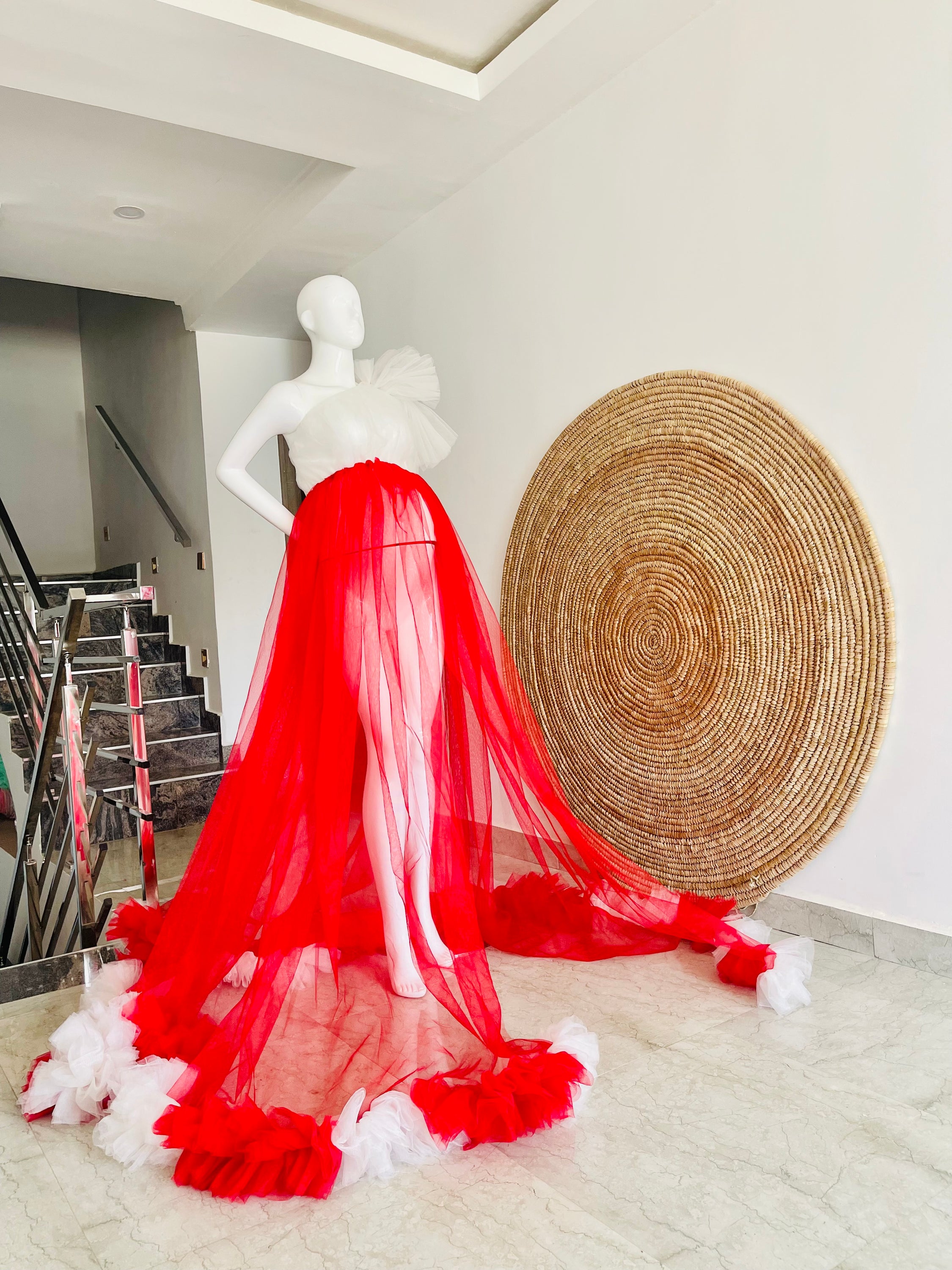 A stylish Liza-Red and White dress featuring a one-shoulder design and flowy tulle fabric, perfect for summer outings.