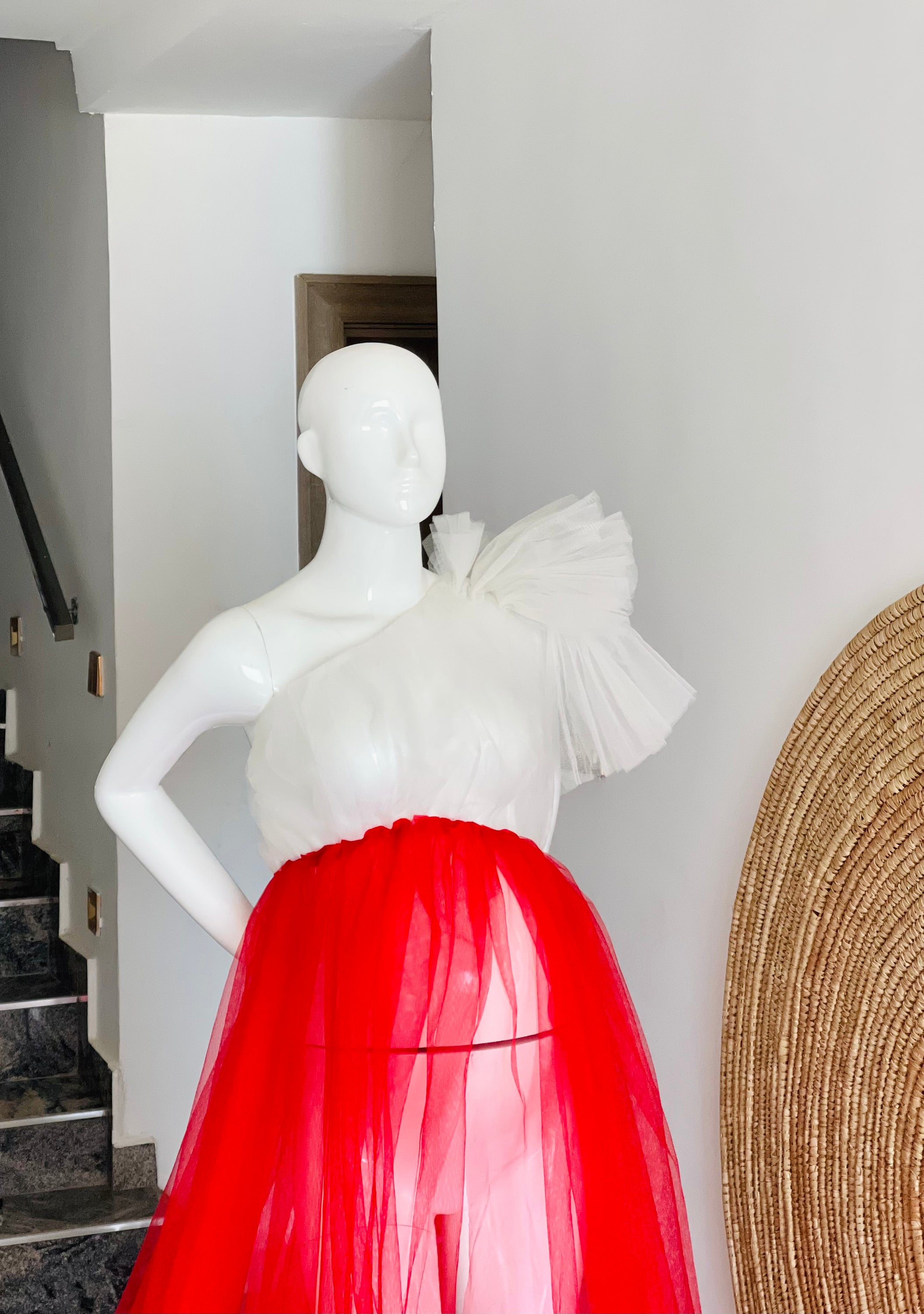 A stylish Liza-Red and White dress featuring a one-shoulder design and flowy tulle fabric, perfect for summer outings.