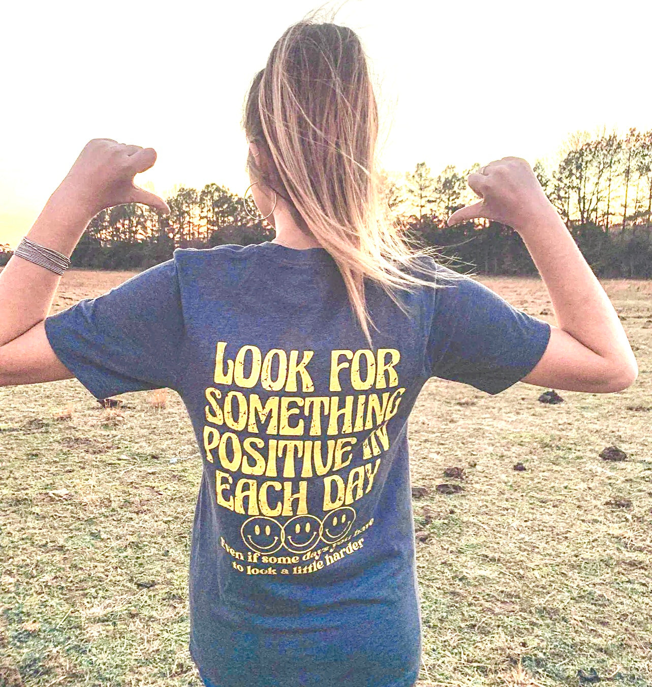 Look for Something Positive Tee featuring vibrant positive messaging, made from a soft cotton-poly blend, displayed on a model.