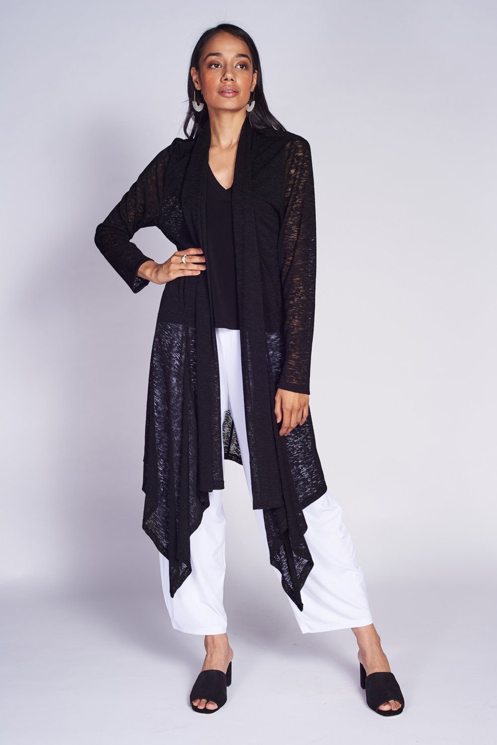 A stylish long cardigan made from textured mesh knit fabric, showcasing a chic silhouette in a versatile color, perfect for layering.