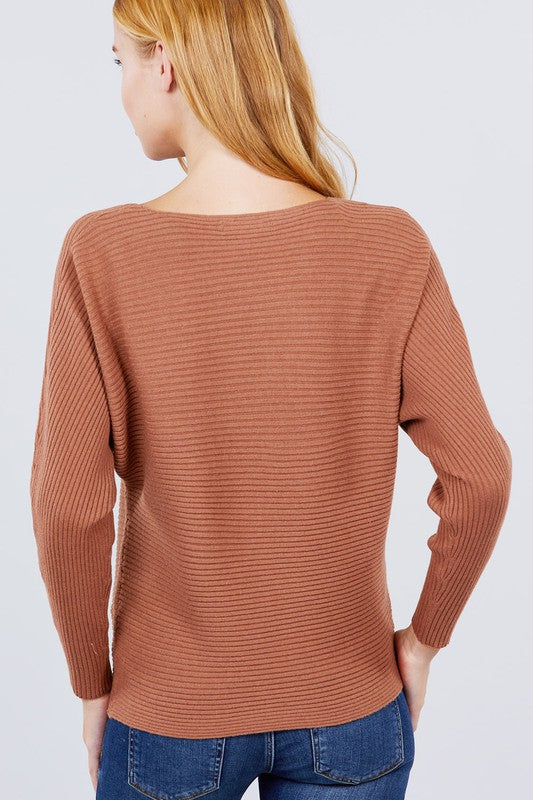 Long dolman sleeve boat neck rib sweater top in soft fabric, showcasing a stylish design suitable for various occasions.