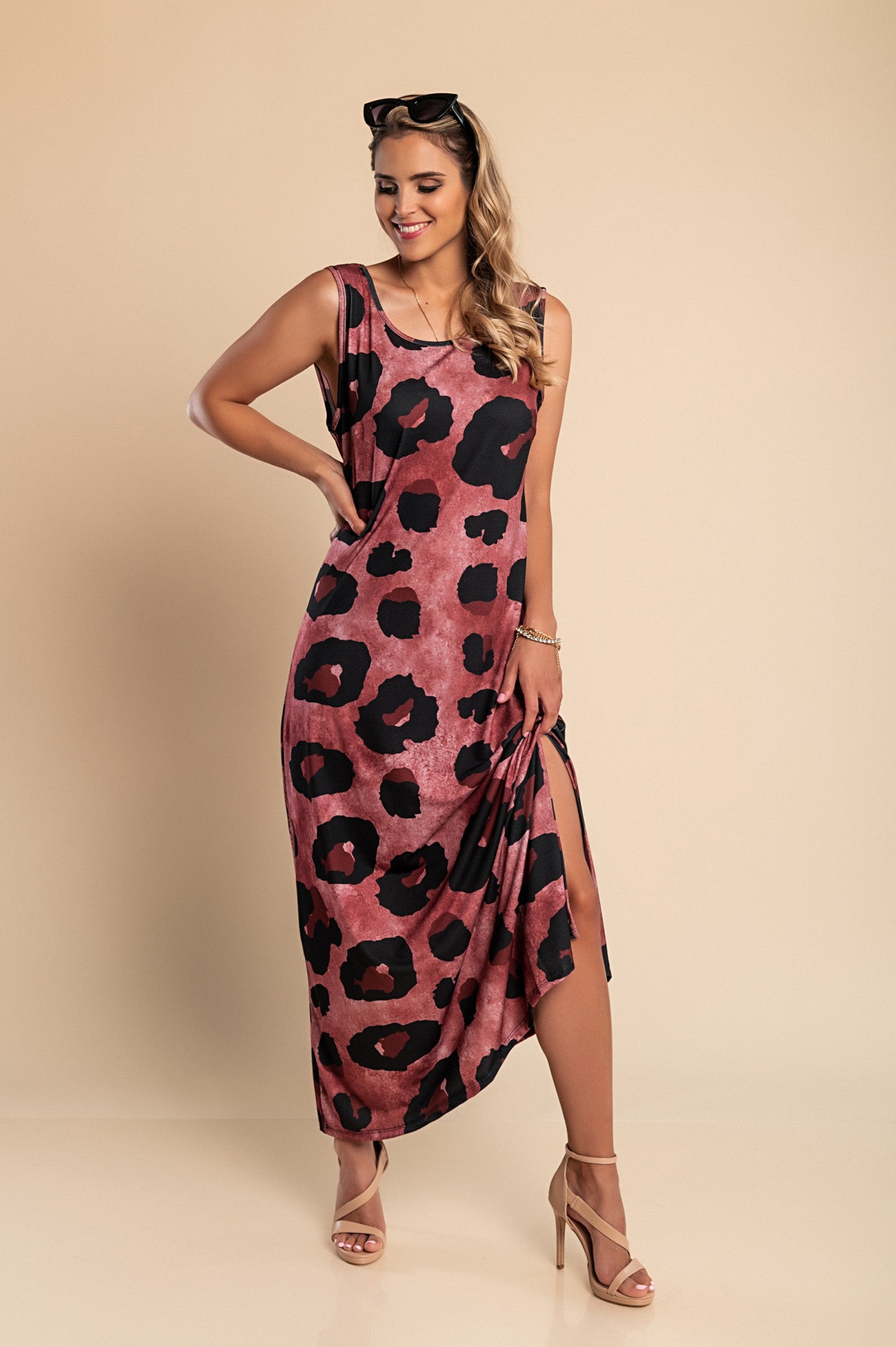 Elegant burgundy long dress featuring a stylish leopard print design with a round neckline and side slit.