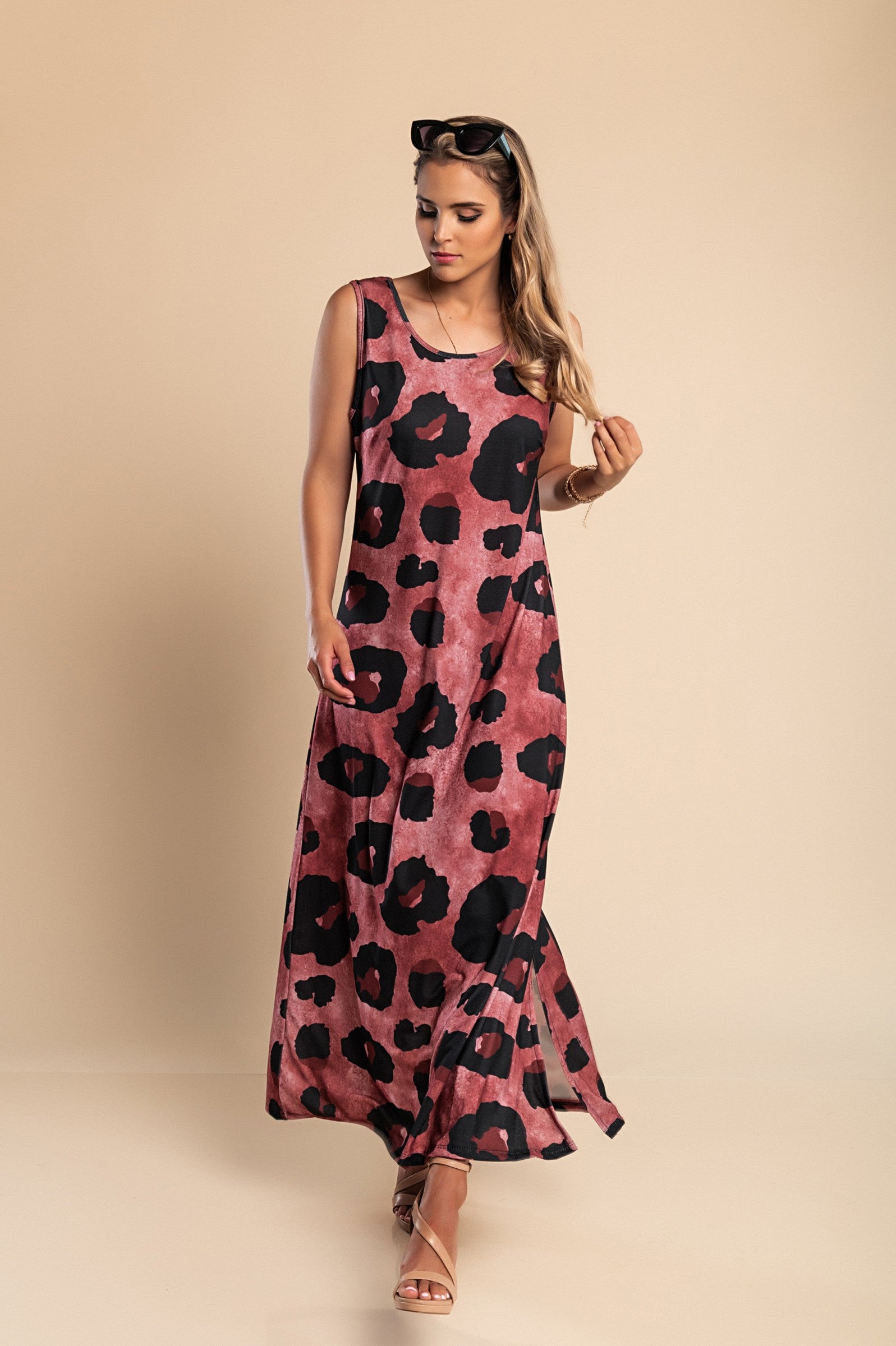 Elegant burgundy long dress featuring a stylish leopard print design with a round neckline and side slit.