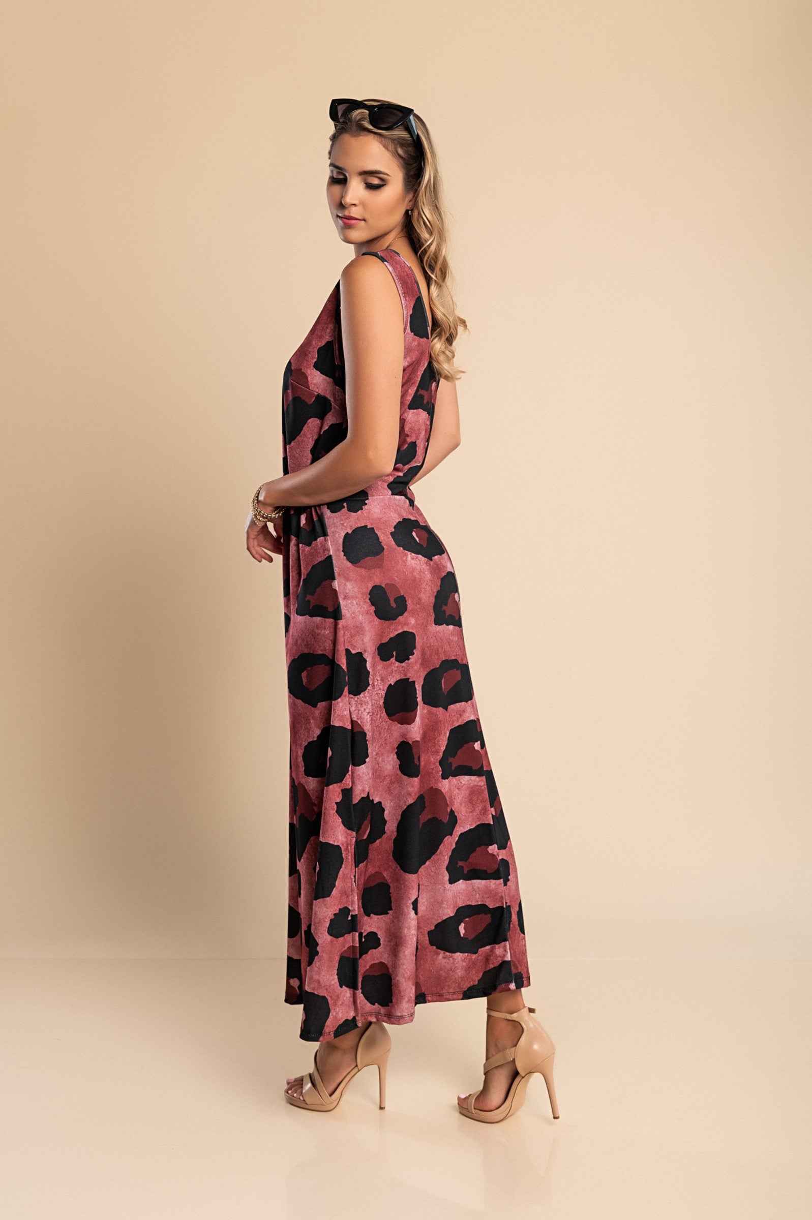 Elegant burgundy long dress featuring a stylish leopard print design with a round neckline and side slit.