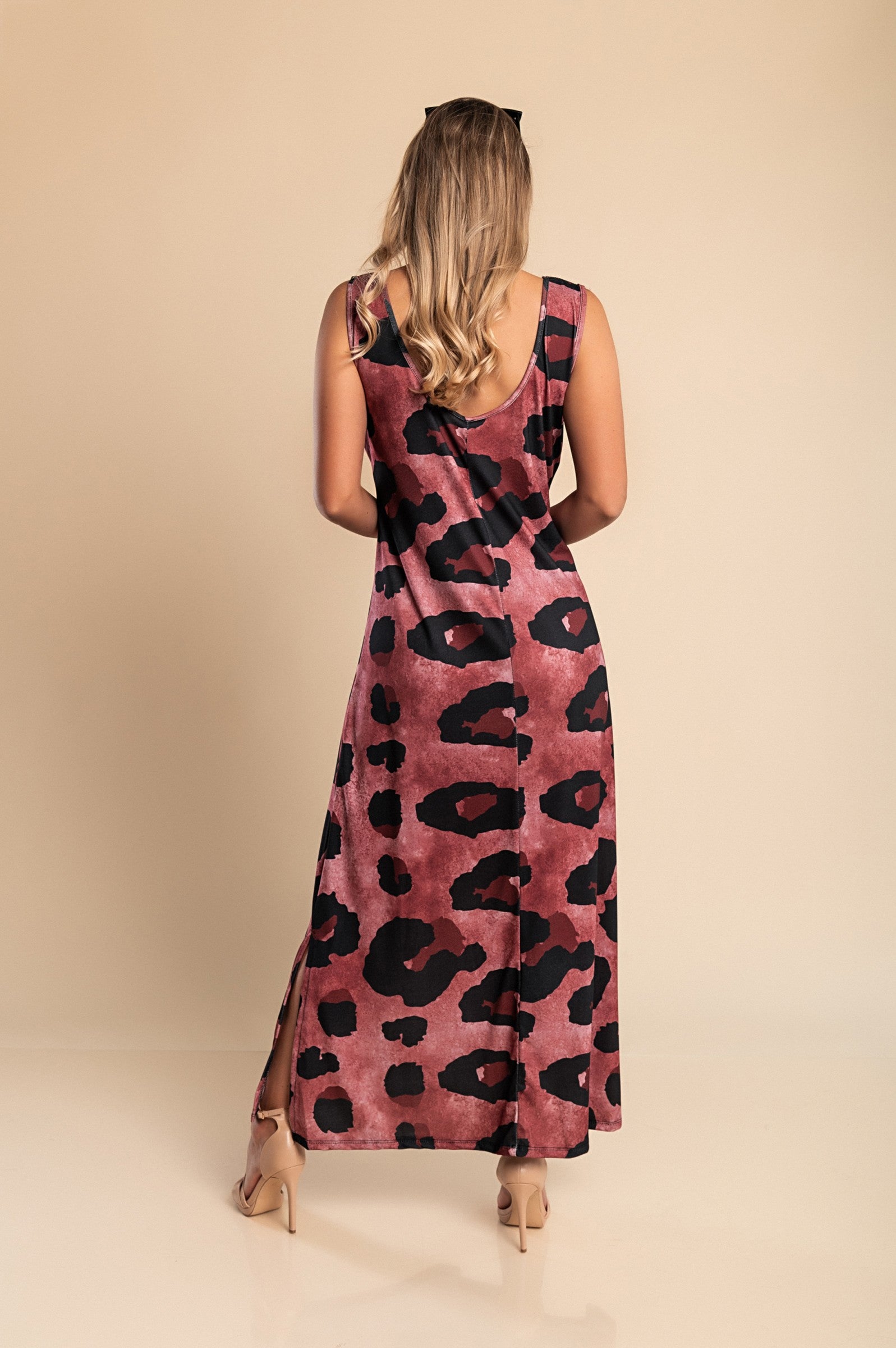 Elegant burgundy long dress featuring a stylish leopard print design with a round neckline and side slit.