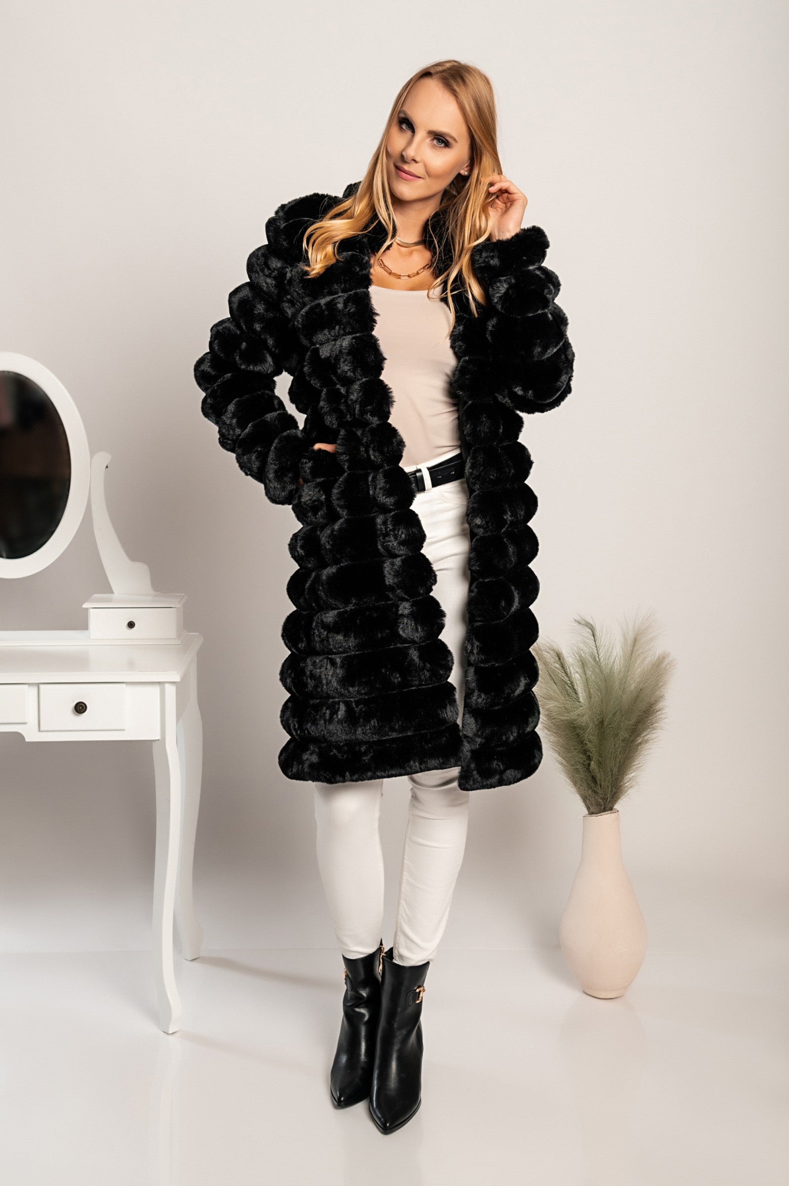 Long elegant black faux fur coat by Benimia with stand-up collar and pockets.