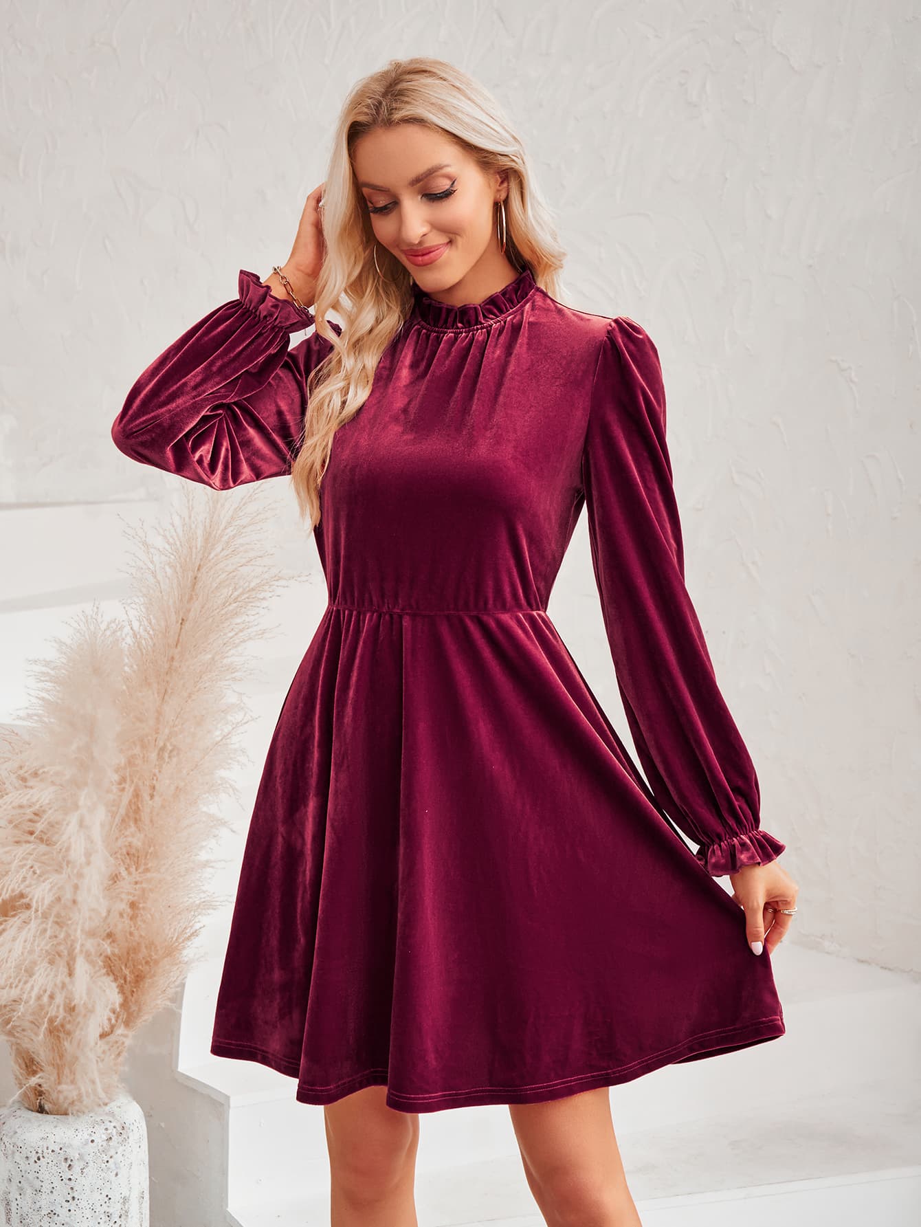 A stylish Long Flounce Sleeve A-Line Dress featuring a mock neck, flounce sleeves, and a chic solid pattern, perfect for various occasions.