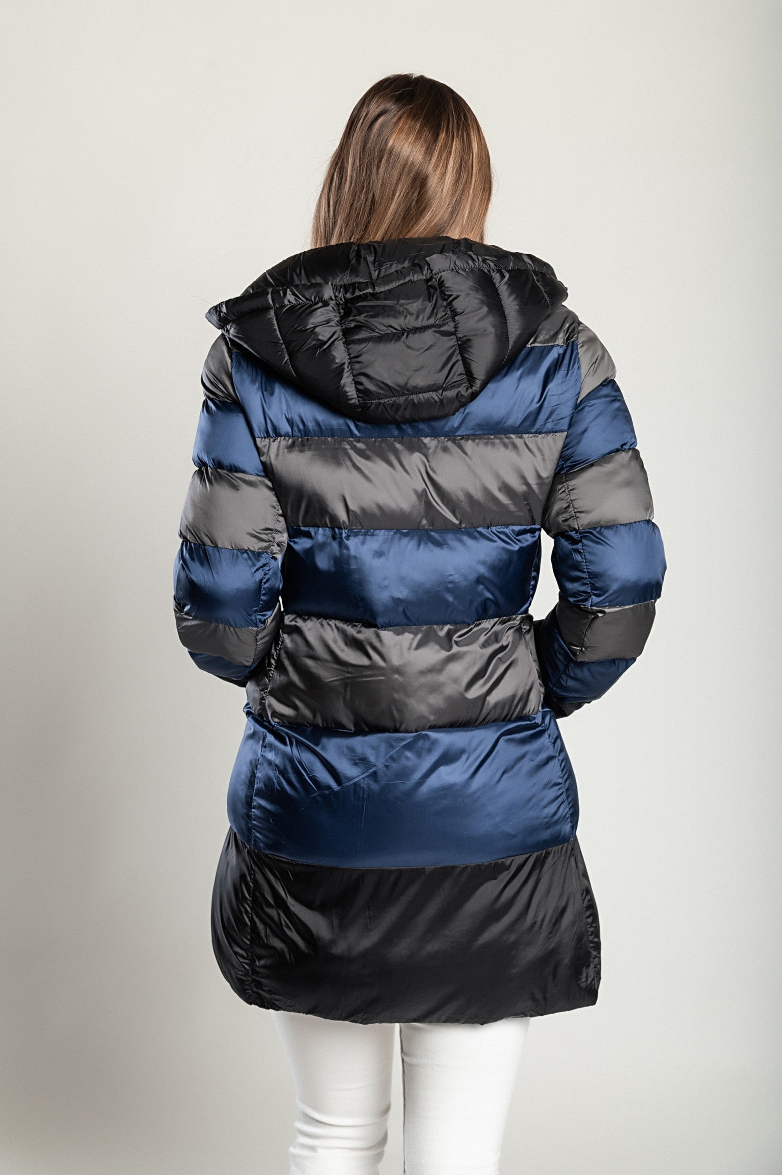 A stylish blue long jacket with a hood and high collar, featuring a zip closure, perfect for winter wear.