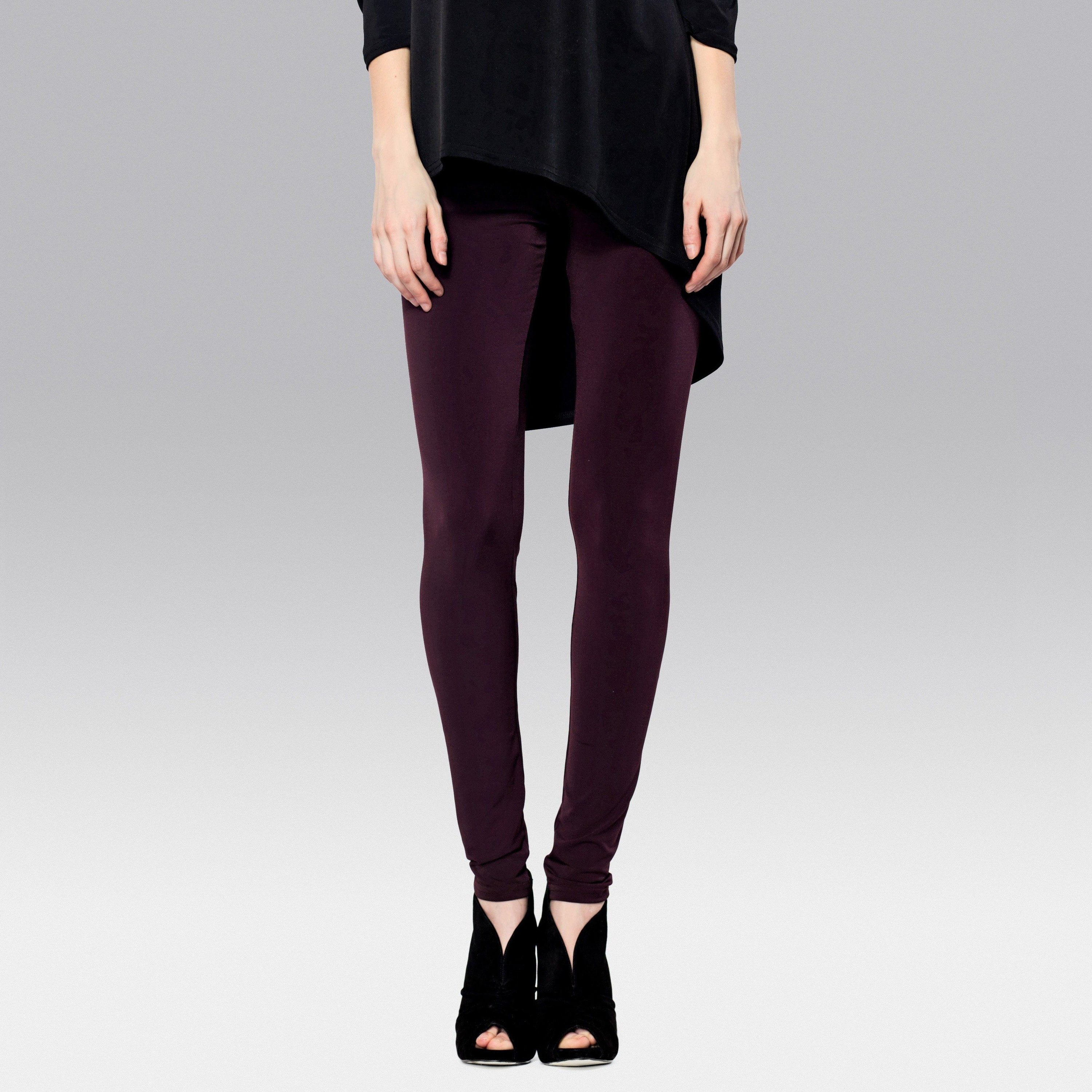 A pair of Long Legging Aubergine showcasing a rich purple color, designed for comfort and style with an elastic waistband.