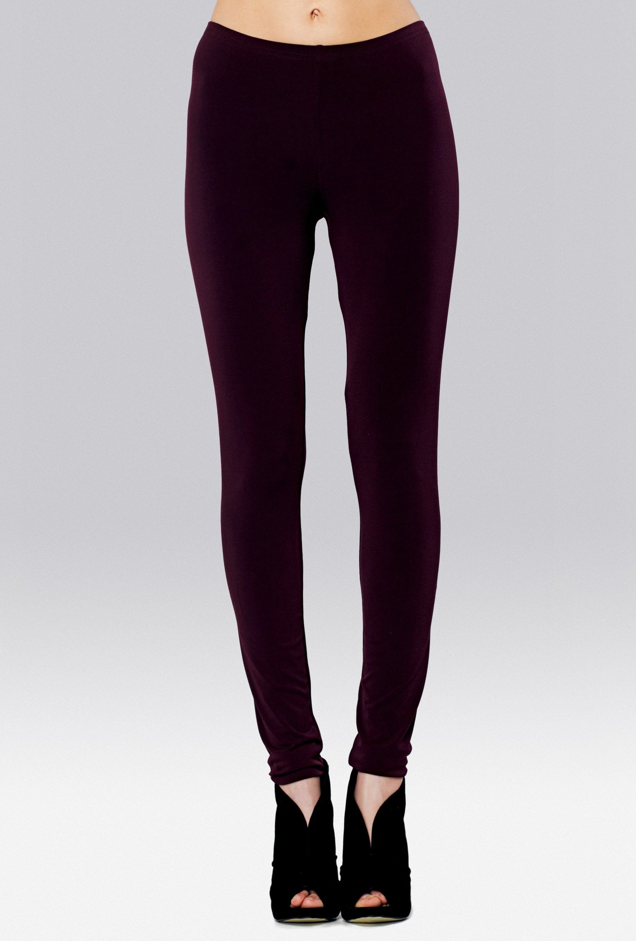 A pair of Long Legging Aubergine showcasing a rich purple color, designed for comfort and style with an elastic waistband.