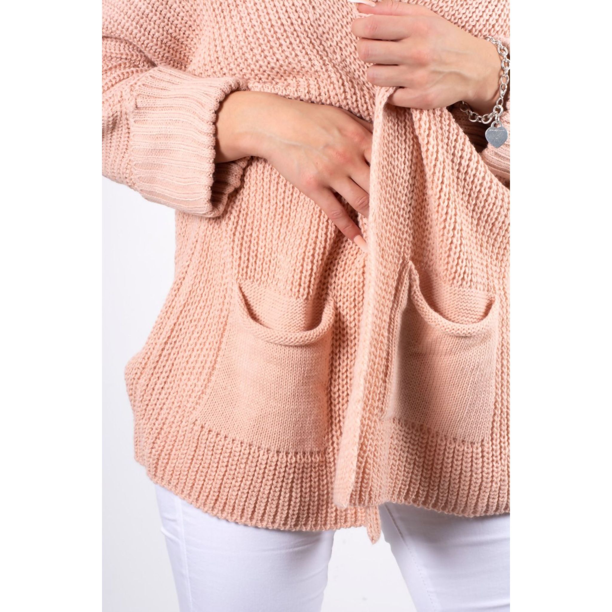 Long Pocket Cardigan in various colours, showcasing its oversized design and pockets.