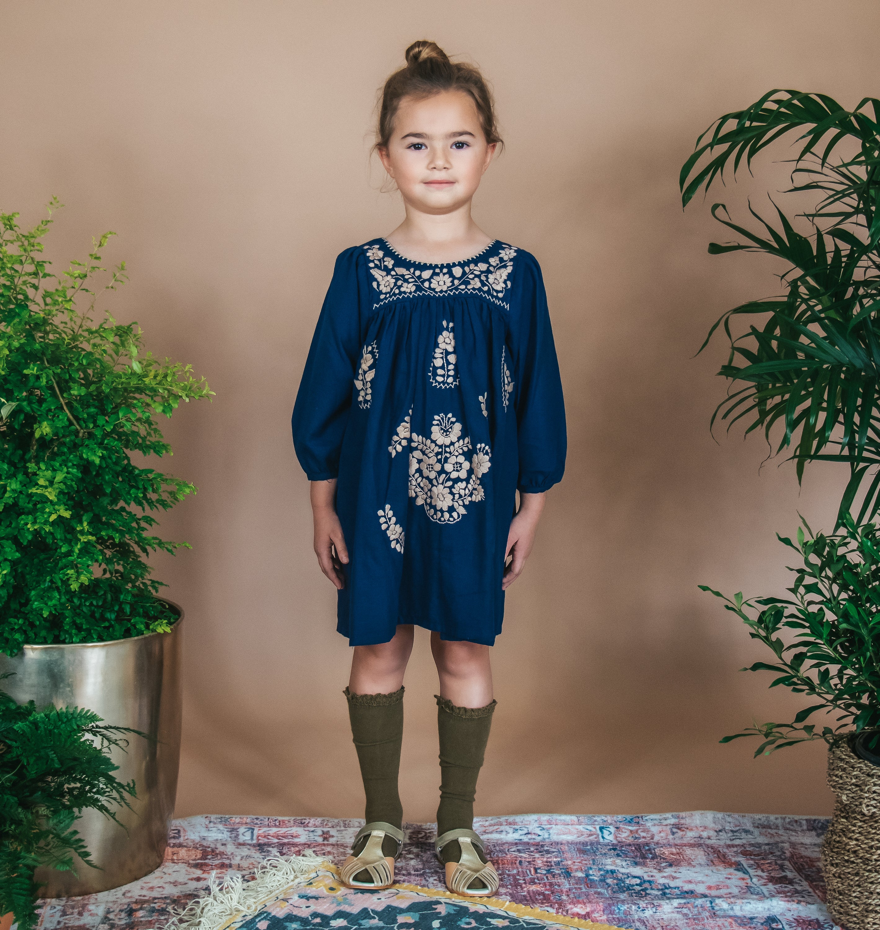 Long Sleeve Autumn Dress in Tan with flutter sleeves and multicolor hand embroidery, made from organic cotton.