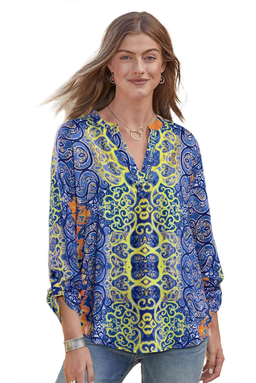 Long Sleeve Blue Moroccan Breeze Tunic featuring a relaxed fit, V-neck, and ikat print pattern in dark blue.