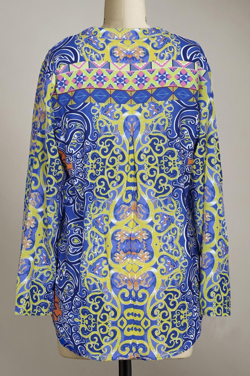 Long Sleeve Blue Moroccan Breeze Tunic featuring a relaxed fit, V-neck, and ikat print pattern in dark blue.