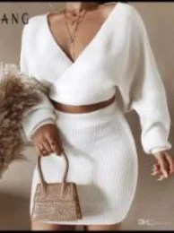 A stylish long sleeve sweater two piece mini skirt set featuring a cropped top with V-neck and a high-rise bodycon mini skirt, perfect for chic outings.