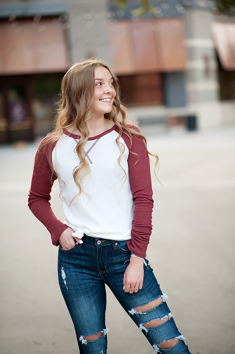 Long sleeve thermal baseball tee in ivory and red, showcasing its stylish design and comfortable fit.