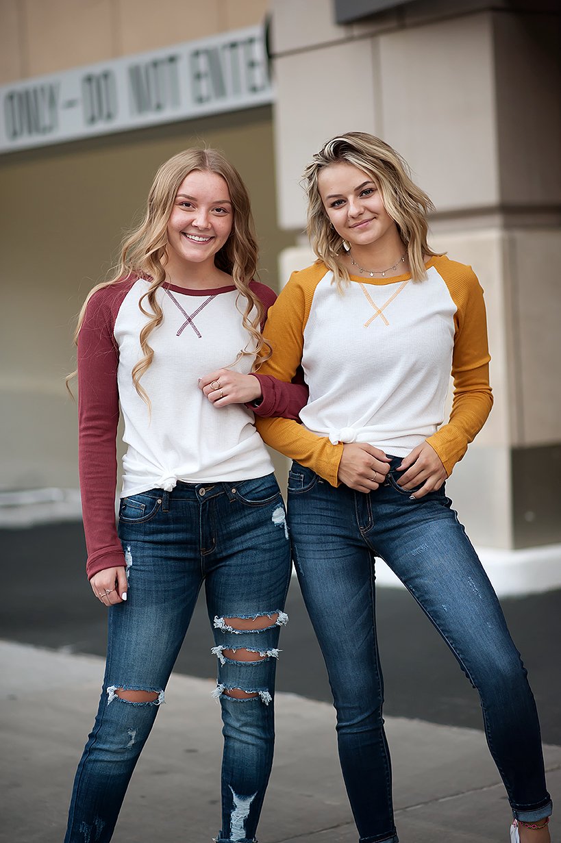 Long sleeve thermal baseball tee in ivory and red, showcasing its stylish design and comfortable fit.