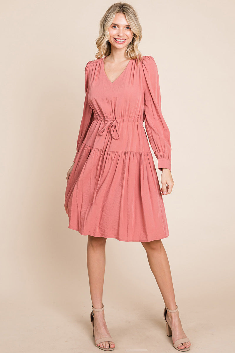 A stylish Long Sleeve Tiered Waist String Ruched Dress featuring a V-neck, long sleeves, and a tiered waist design, perfect for various occasions.