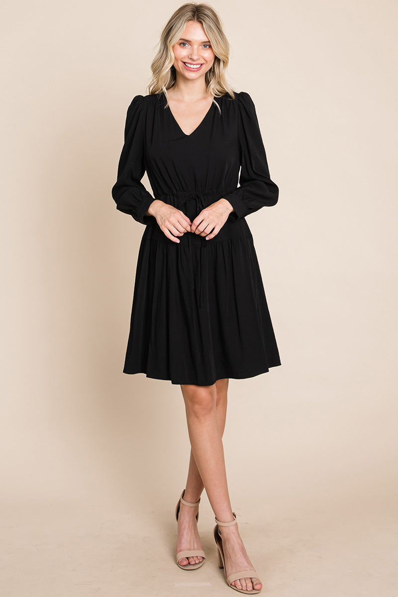 A stylish Long Sleeve Tiered Waist String Ruched Dress featuring a V-neck, long sleeves, and a tiered waist design, perfect for various occasions.