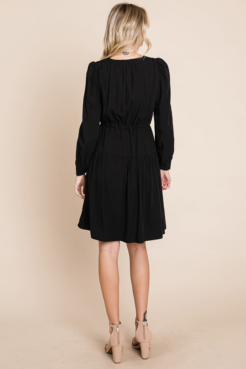 A stylish Long Sleeve Tiered Waist String Ruched Dress featuring a V-neck, long sleeves, and a tiered waist design, perfect for various occasions.