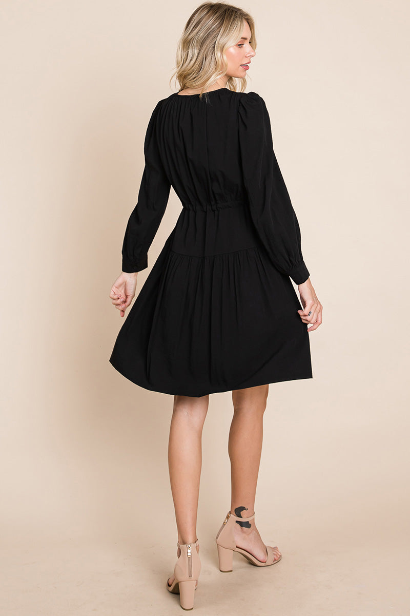 A stylish Long Sleeve Tiered Waist String Ruched Dress featuring a V-neck, long sleeves, and a tiered waist design, perfect for various occasions.