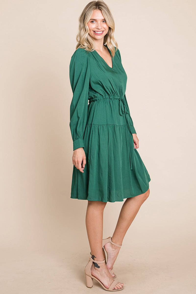 A stylish Long Sleeve Tiered Waist String Ruched Dress featuring a V-neck, long sleeves, and a tiered waist design, perfect for various occasions.