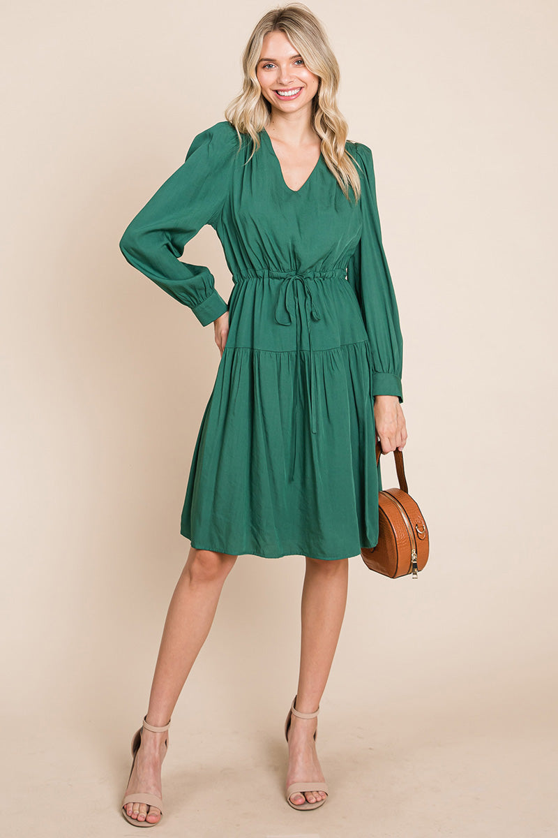 A stylish Long Sleeve Tiered Waist String Ruched Dress featuring a V-neck, long sleeves, and a tiered waist design, perfect for various occasions.