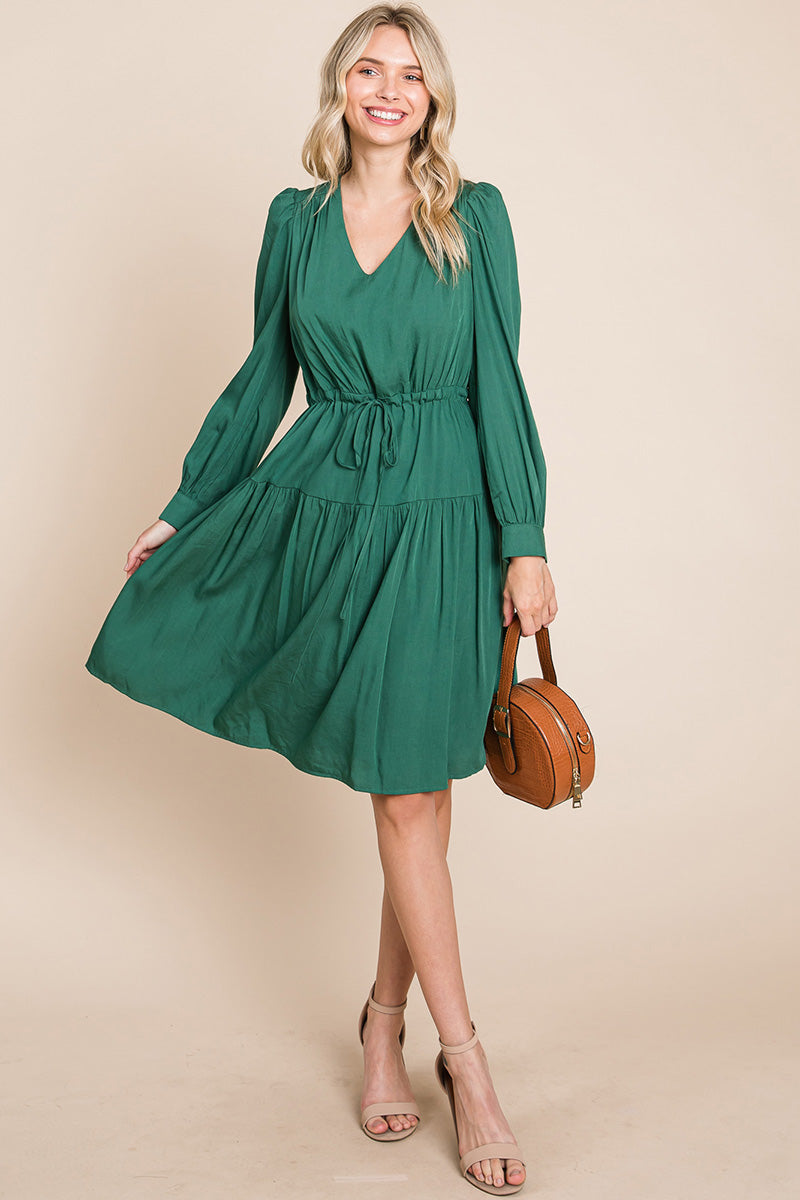 A stylish Long Sleeve Tiered Waist String Ruched Dress featuring a V-neck, long sleeves, and a tiered waist design, perfect for various occasions.