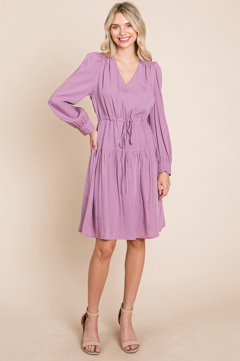 A stylish Long Sleeve Tiered Waist String Ruched Dress featuring a V-neck, long sleeves, and a tiered waist design, perfect for various occasions.