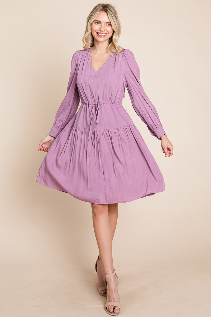 A stylish Long Sleeve Tiered Waist String Ruched Dress featuring a V-neck, long sleeves, and a tiered waist design, perfect for various occasions.